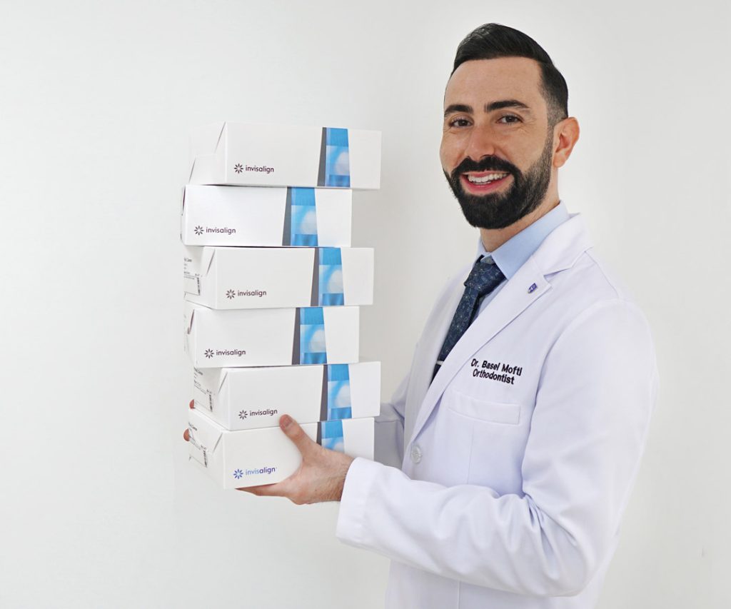 Certified Orthodontist working on Damon Braces in Dubai, Dr. Basel Mofti